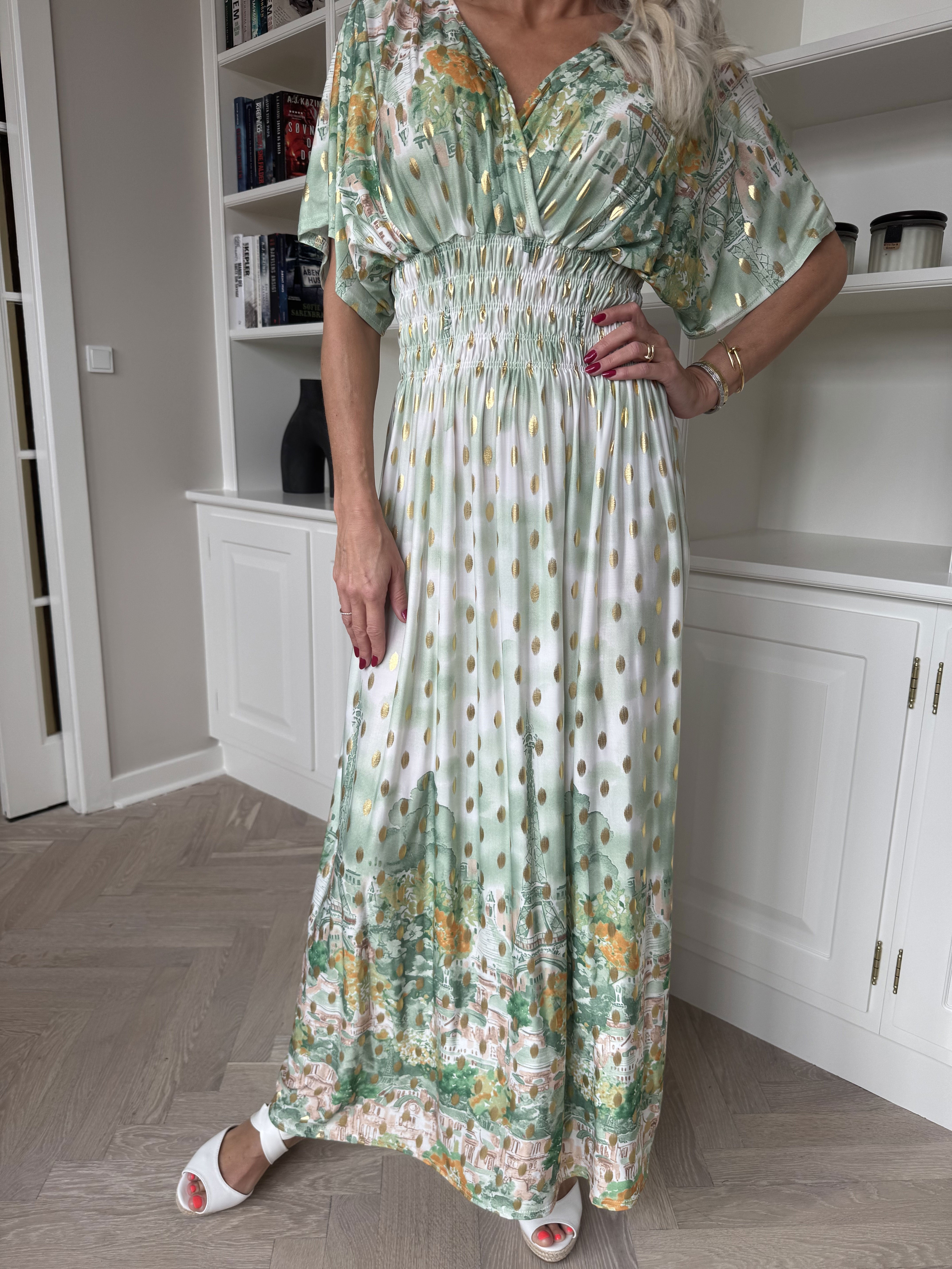 Pams Paris - Lång elastisk mönstrad klänning med guldnitar